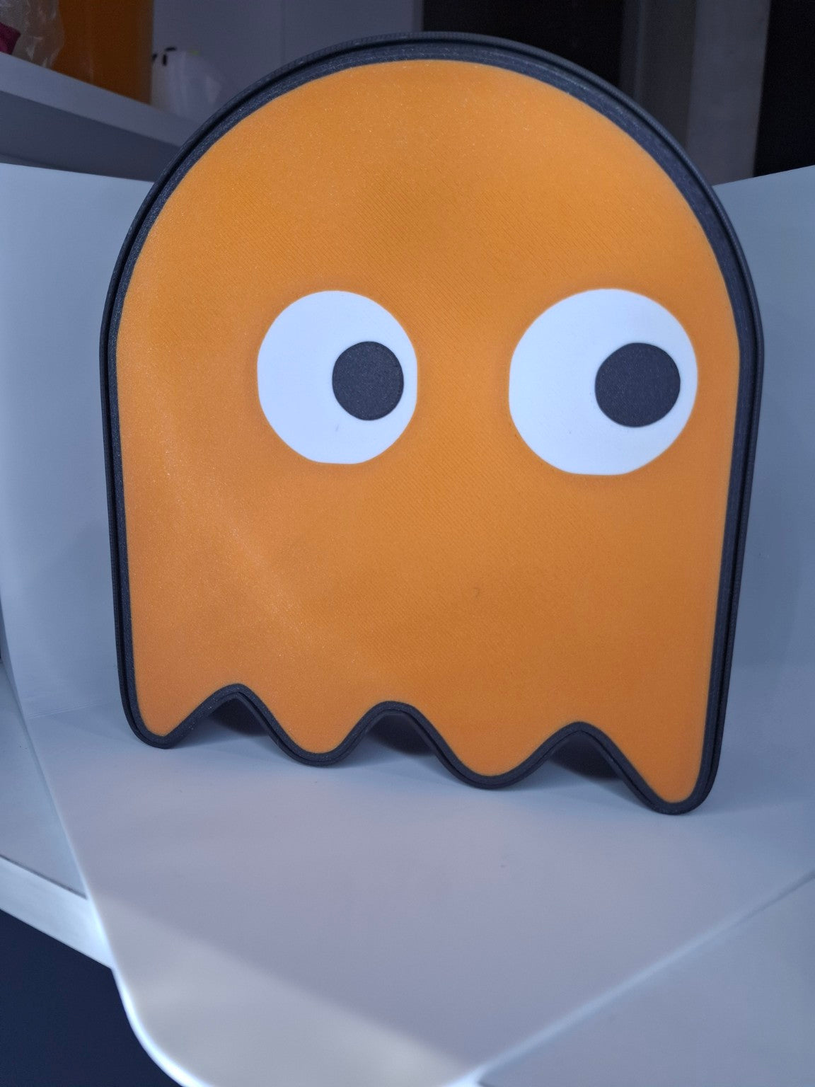 Alcancía Pac-Man fantasma naranjo