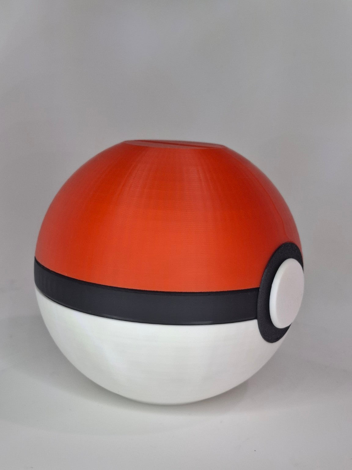 Alcancía bola de Pokémon - vista lateral