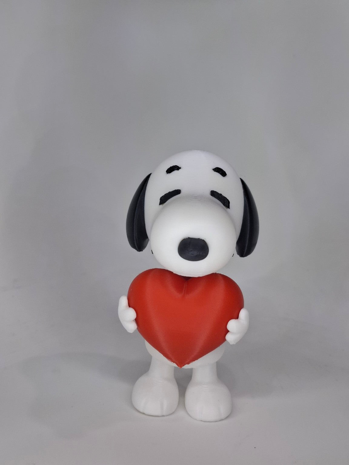 Figura Snoopy con corazón - vista frontal